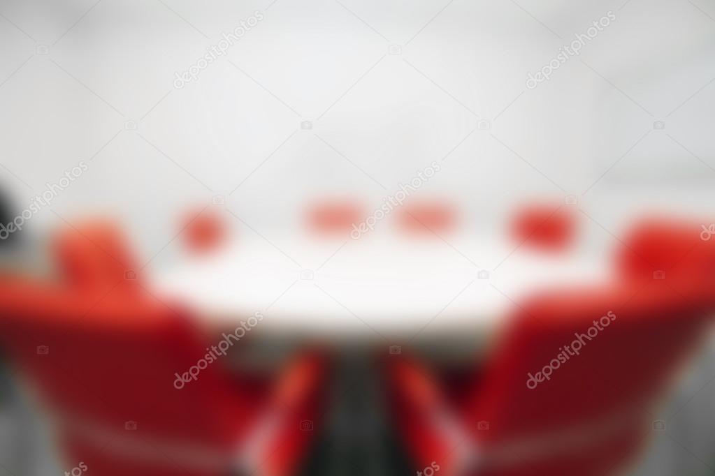 Blur Office with red chairs