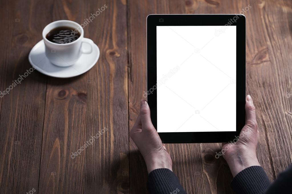 Woman shows screen of digital table