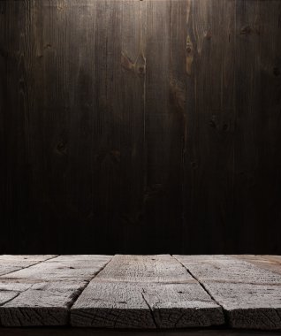 Dark wooden background texture. Wood shelf, grunge industrial interior with light bulb