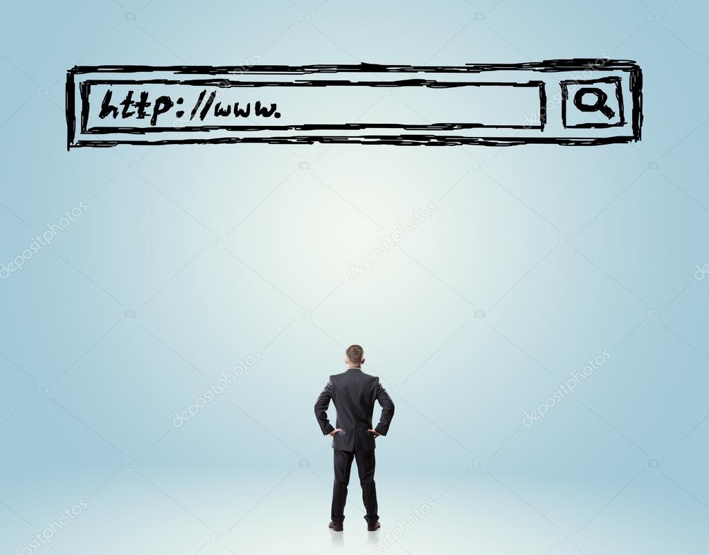 Man looking up at a search bar