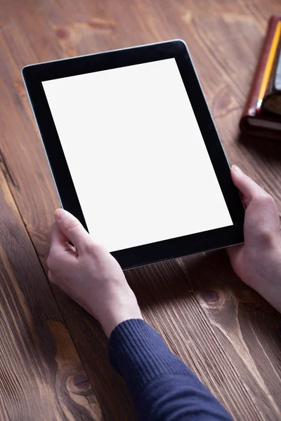 Woman shows screen of digital tablet in her hands — Stock Photo, Image