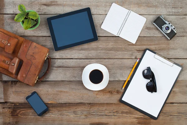 Digital tablet computer over old grey wooden background table. — Stock Photo, Image