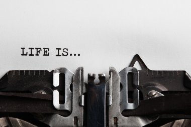 Life is sign with typewriter clipart