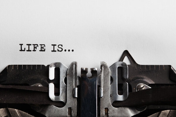 Life is sign with typewriter