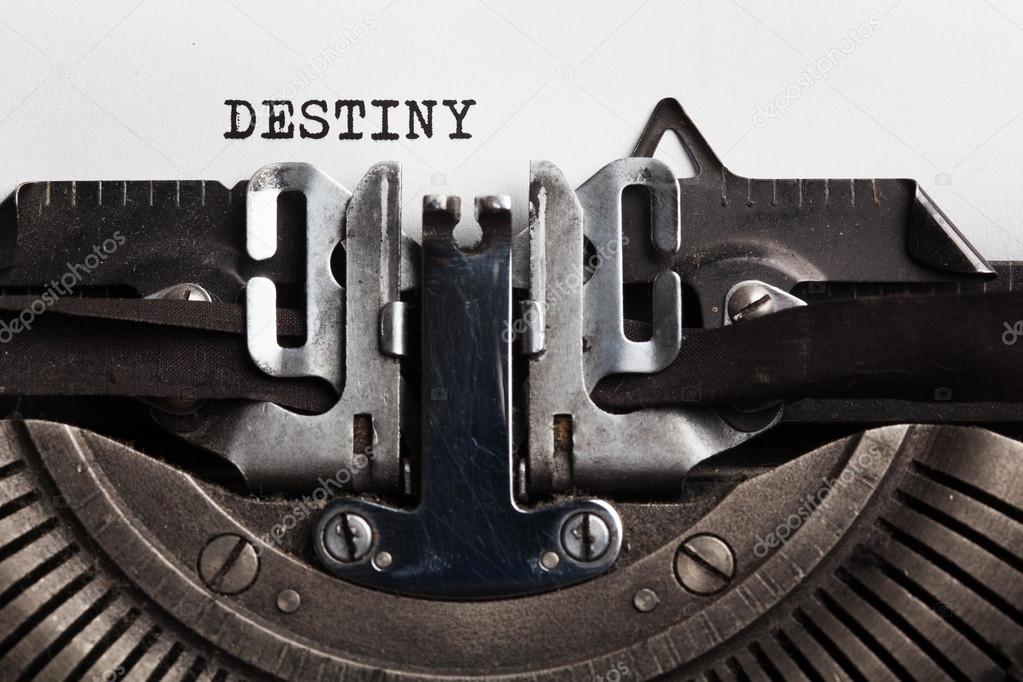 Destiny. typewriter with paper sheet.