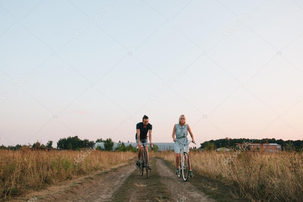  couple racing on bikes