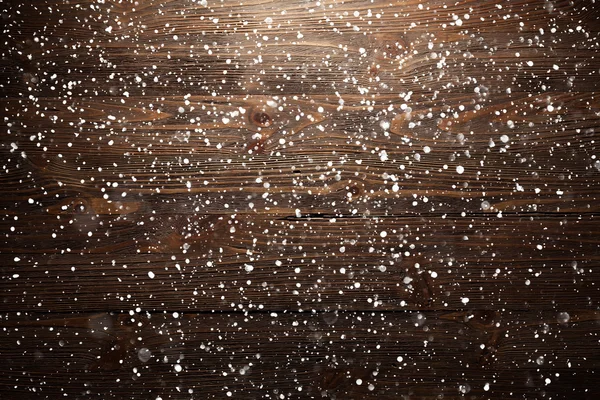 Weihnachten Holz Hintergrund mit fallenden Schneeflocken — Stockfoto