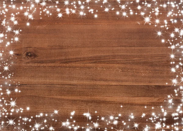 Wooden board with snow flakes . Christmas background — Stock Photo, Image