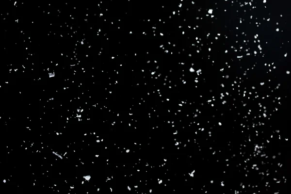 Snow on a black background for use as an overlay layer — Stock Photo, Image