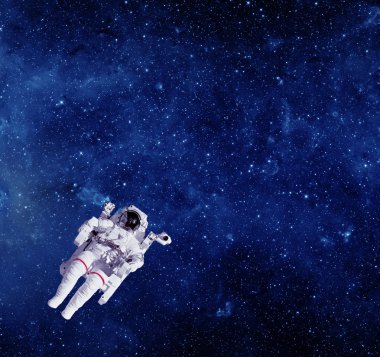 Uzayda bir astronot. Bu görüntünün elementleri NASA tarafından desteklenmektedir.