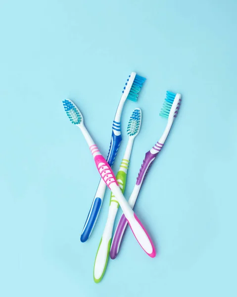 Four Colorful Toothbrushes Group Four Toothbrushes Blue Background Concept Healthy — Stock Photo, Image