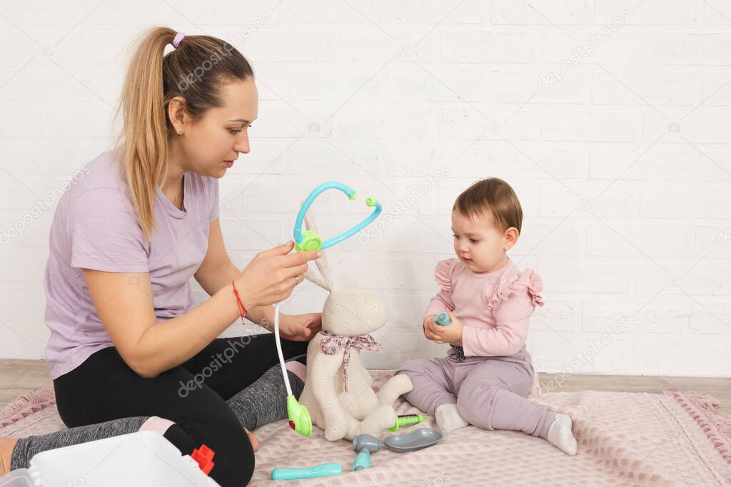 Mom and child playing lifestyle concept care and health