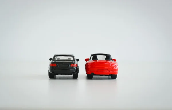 Carros de brinquedo vermelho e preto — Fotografia de Stock