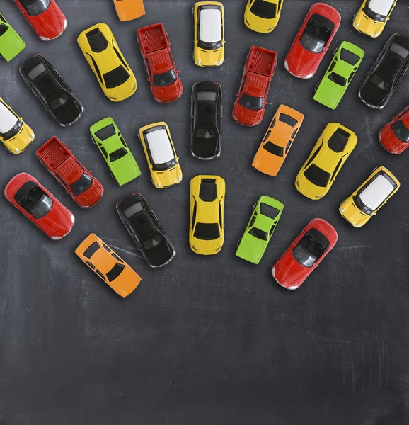 Vista superior em carros de brinquedo coloridos — Fotografia de Stock