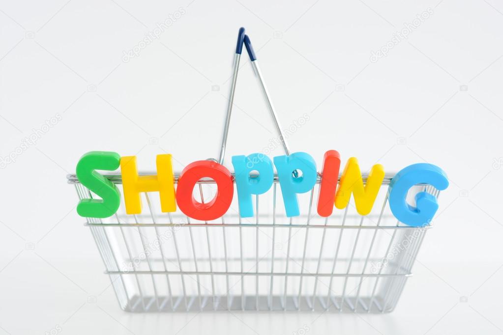shopping basket with colorful word Shopping