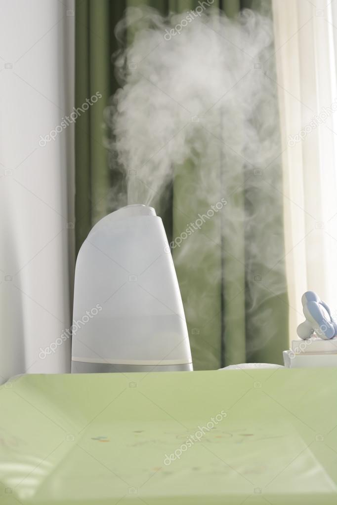 Humidifier blowing off steam — Stock Photo © Ai825 124470876
