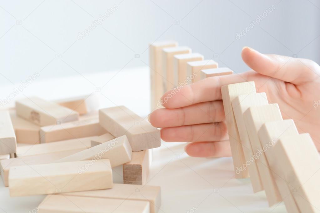 hand stopped row of falling blocks