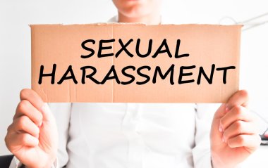 Sexual harassment text on cardboard clipart