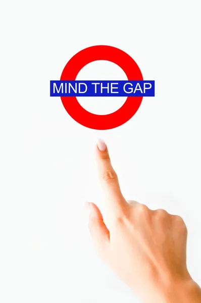 Mind the gap sign on white — Stock Photo, Image