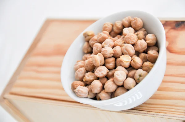 Chickpeas in a bowl — Stock Photo, Image