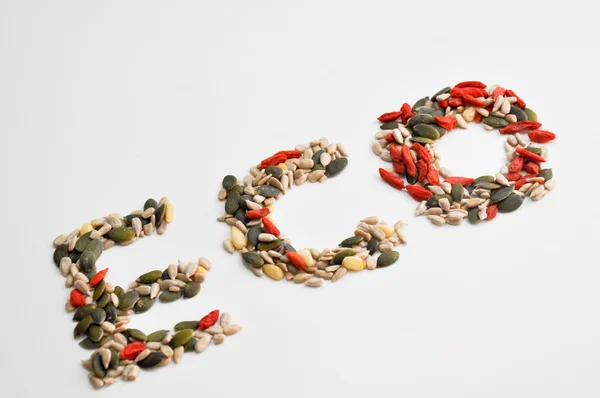 Eco teken gemaakt van verschillende zaden — Stockfoto
