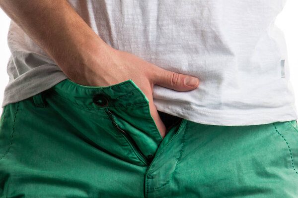 groin pain. male sexual problems. the man's hands were stuck in his underpants