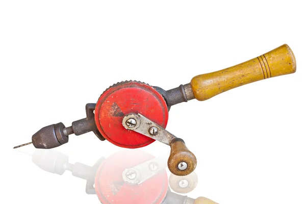 Old rusty hand drill on white background. — Stock Photo, Image