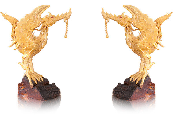 Golden statue swan on isolate background