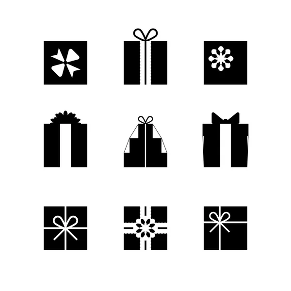 Silhouettes of gift boxes isolated — Stock Vector