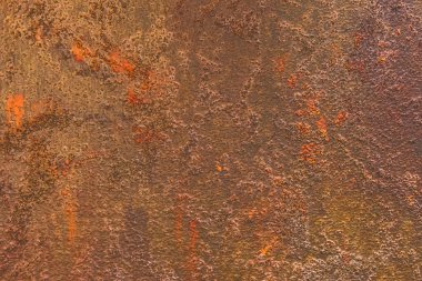 Soyut paslı turuncu-kahverengi desenli eski metal yüzey kirli demir desen arka plan.