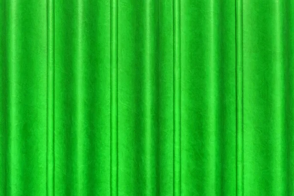 Sliding door, green curtain scene from the leather of the conference room in the hotel. Wavy abstract pattern wall texture background.