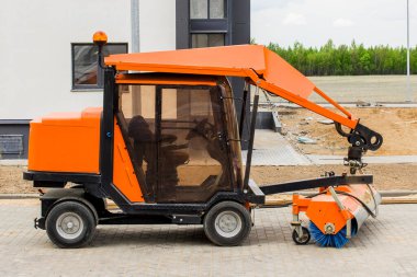 Temizlik makinesi, modern servis ve teknoloji ekipmanları şehir temizleme yolu, kaldırım, asfalt.