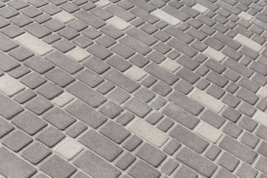 Yüzey kentsel zemin dokusu taş mozaik fayanslar gri yol levhaları arka plan.