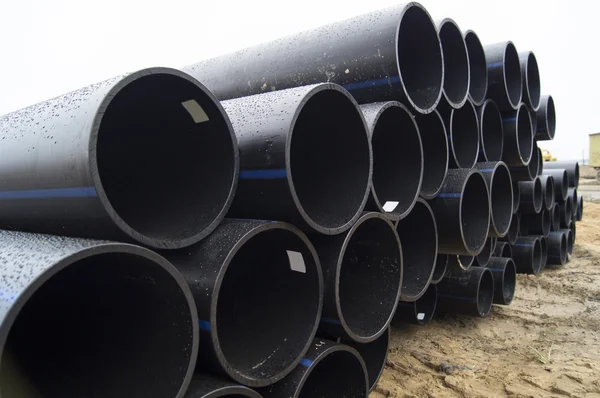 Storage of polyethylene pipes of large diameter — Stock Photo, Image