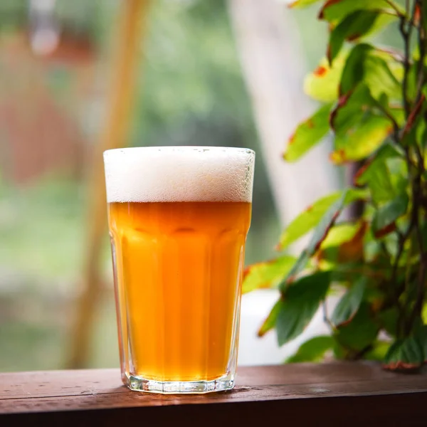 Cold Light Beer White Foam Glass Wooden Table Outdoors Blurred — Stock Fotó