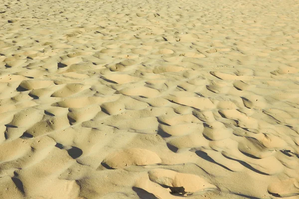 Золотой песок — стоковое фото