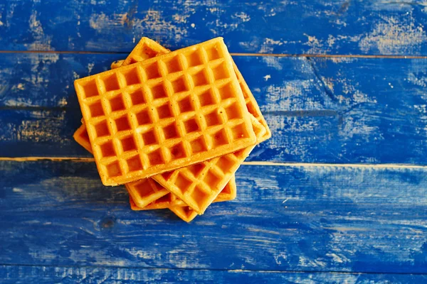 Belgian waffles on wooden table — Stock Photo, Image