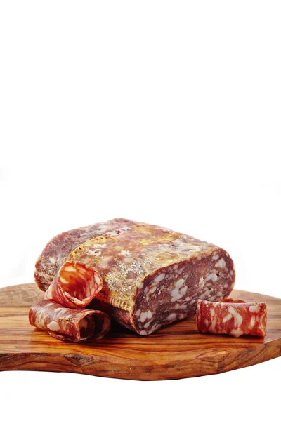 Salami on wooden board — Stock Photo, Image