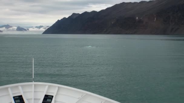 Snowy mountains and the sea in Arctic. Iceland. — Stock Video