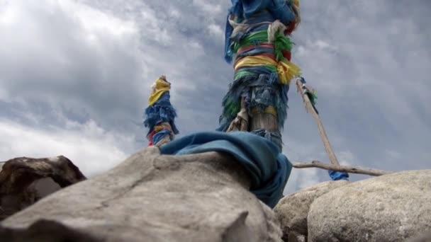 Shaman obo sacrifices on stones on background of clouds in Mongolia. — Stock Video