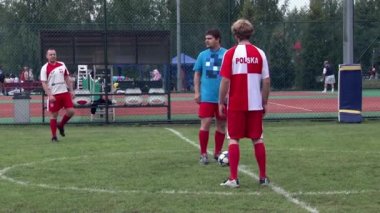 Futbolcular şirket etkinlikleri sırasında oyun oynarlar.