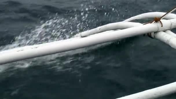 Bamboo wings of philippine boat in sea on islands of Republic of Philippines. — Stock Video