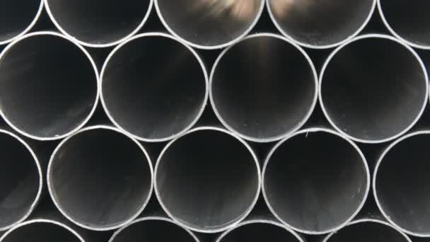 Stainless steel pipes are finished product of metal rolling in factory. — Stock Video