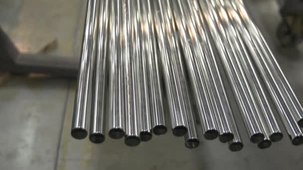 Stainless steel pipes in a warehouse of plant — Stock Video