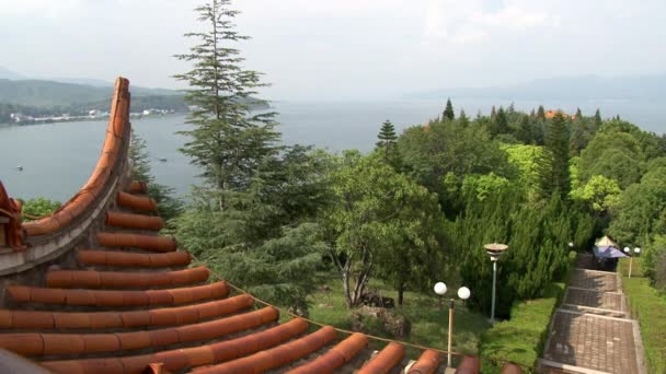 Chinese Buddhist monastery on Fuxian Lake in Yunnan Province China. — Stock Video