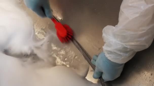 Cleaning meat slicer meat red brush. — Stock Video