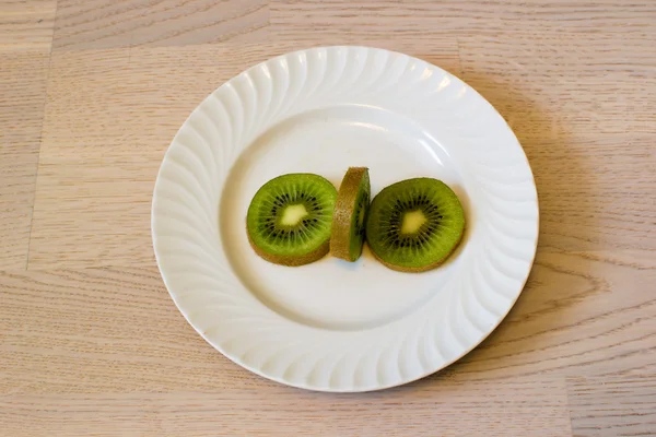 Kiwi eating — Stock Photo, Image