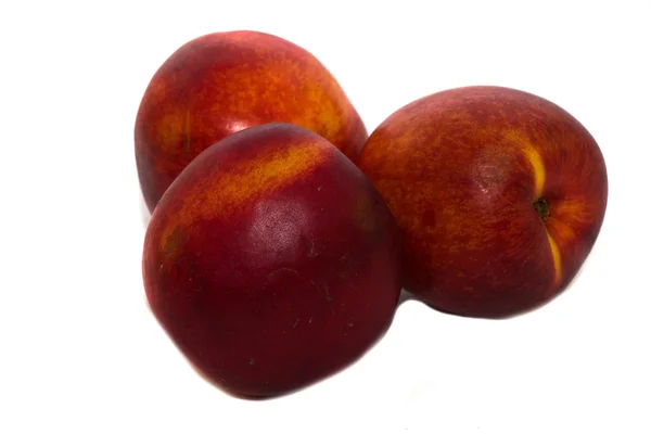 Eating nectarine — Stock Photo, Image