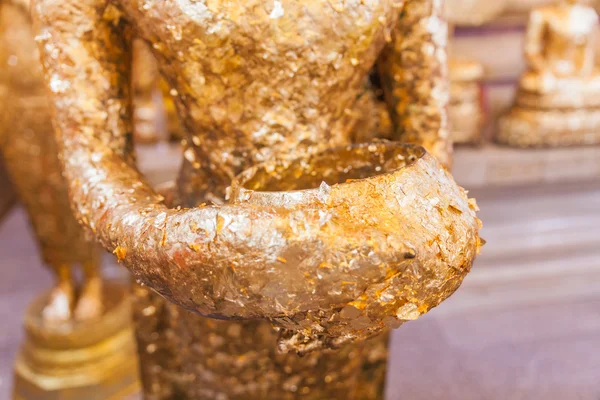 Closeup Gilded ancient buddha statue with alms bowl — Stock Photo, Image