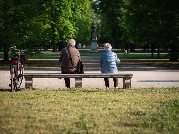 Elderly Man Woman Sitting Far Apart Bench Public Park — Stock Photo, Image
